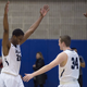 Yale’s Justin Sears (left) and Thomas Ryan (center) celebrate the team’s win against Columbia on Saturday. (Image via Associated Press/Bryan R. Smith)